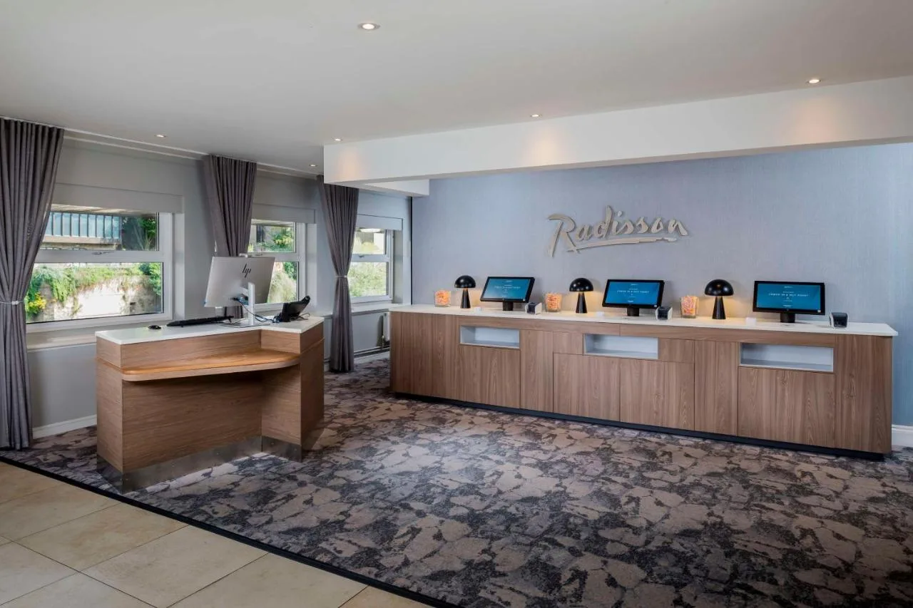 Reception desk with monitors at Radisson Hotel York on North Street