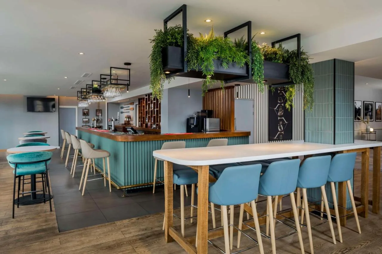 Bar with blue stools and counter at Radisson Hotel York